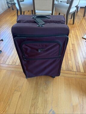 Tumi Burgundy Softside Carry-On Spinner